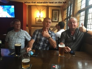 Whos that miserable twat on the left